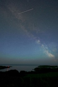 International Space Station transits at approx 24,000km/hr altitude approx 400km above the beacon marking the entrance to Castlehaven Harbour, West Cork, with Galactic Core on the Atlantic horizon
