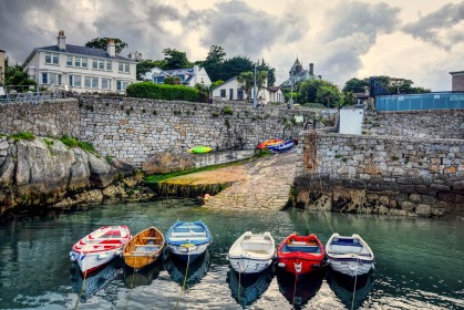 Rain Clouds over Coliemore Harbour by George Jackson